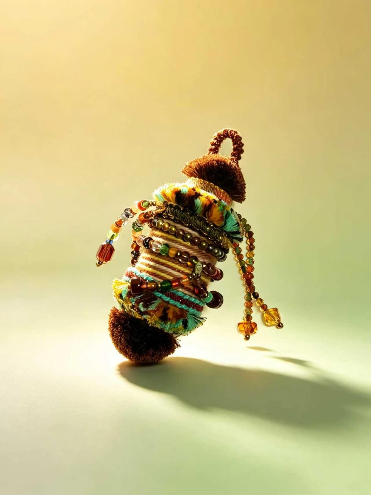 ce6a193cfb36b04feff338e1cb9b0e06 Woven Spool Charm -Amber Savannah(One of a kind) - Image 1